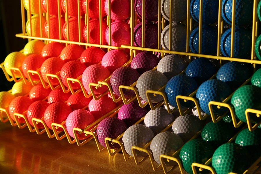 Miniature Golf Balls In A Rack